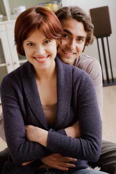 Portrait of smiling couple. Photo : Rob Lewine