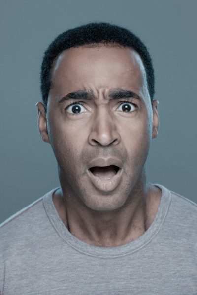 Studio shot of shocked man. Photo : Rob Lewine