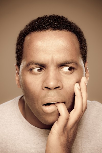 Studio shot of surprised mid adult man. Photo : Rob Lewine