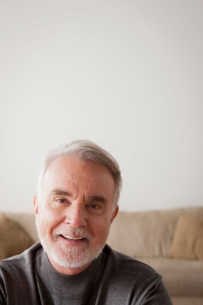 Portrait of smiling senior man. Photo : Rob Lewine