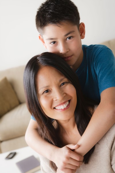 Son embracing mother. Photo : Rob Lewine