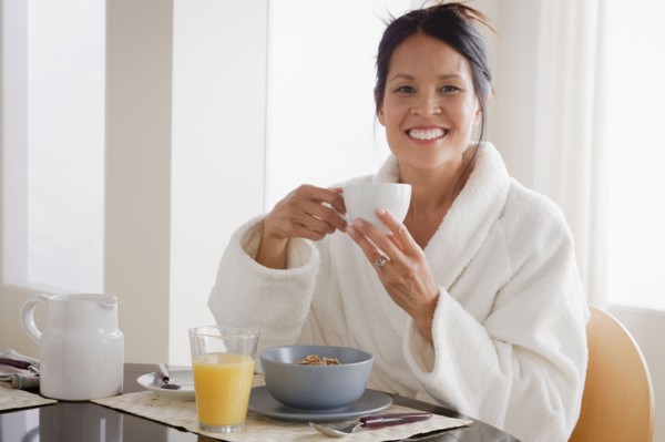 Woman having breakfast. Photo : Rob Lewine