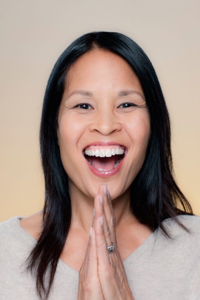 Portrait of laughing woman. Photo : Rob Lewine