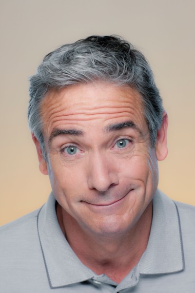 Studio Portrait of mature man smiling. Photo : Rob Lewine