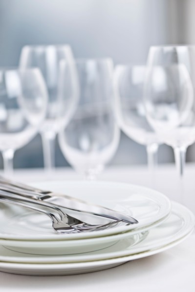 Dishes and cutlery prepared for meal. Photo : Elena Elisseeva