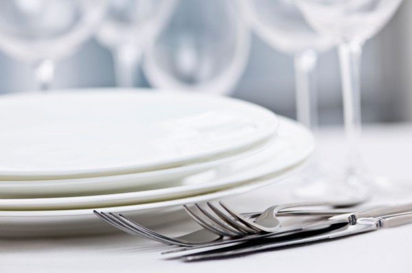 Dishes and cutlery prepared for meal. Photo : Elena Elisseeva