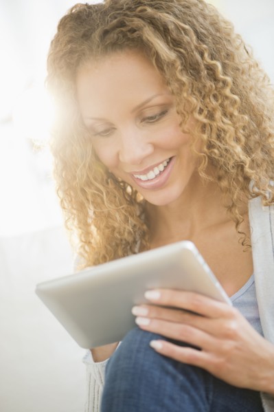 Woman looking at tablet pc.