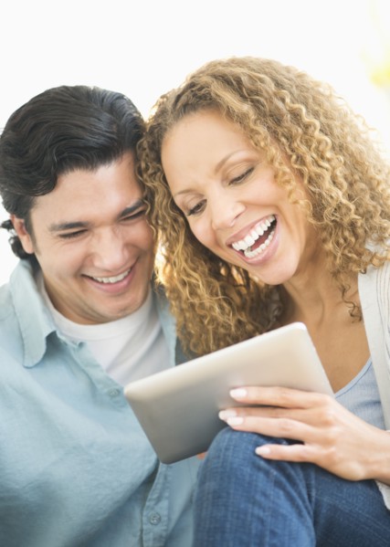 Couple looking at tablet pc.