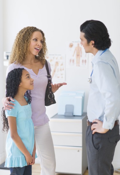 Mother with daughter (12-13) visiting pediatrician.
