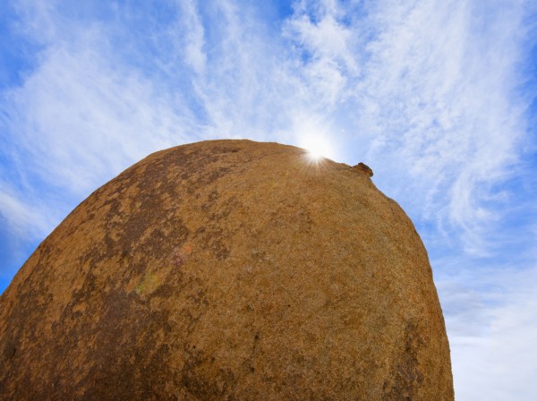 USA, California, Joshua Tree National Park, Boulder with sunny sky.