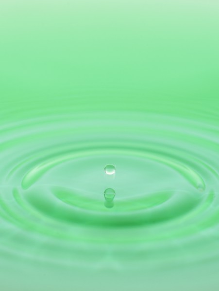 Drop falling into water.