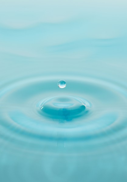 Drop falling into water.