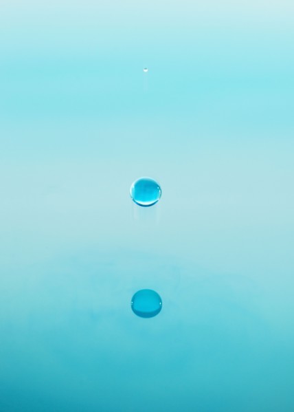 Drop falling into water.
