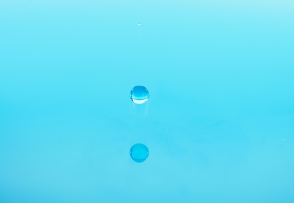 Drop falling into water.