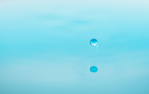 Drop falling into water.