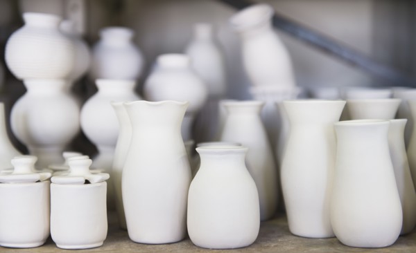 USA, New Jersey, Jersey City, Pottery on shelves.