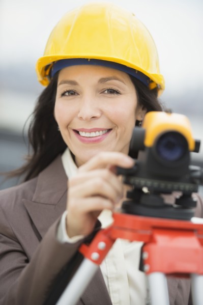Architect using theodolite.