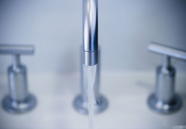 Water flowing from faucet. 
Photo : Jamie Grill