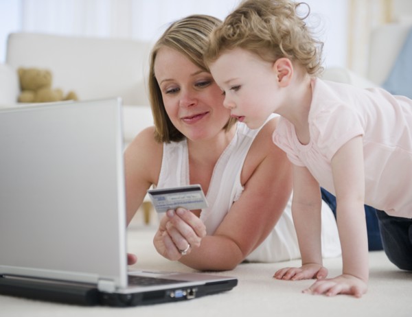 Mother and daughter (2-30 online shopping. 
Photo : Jamie Grill