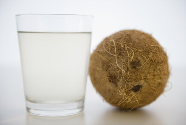 Coconut water in glass. 
Photo : Jamie Grill