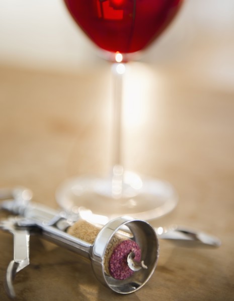 Corkscrew and glass of wine. 
Photo: Jamie Grill