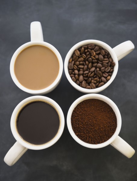 Close up coffee cups with coffee and roast coffee beans. 
Photo : Jamie Grill