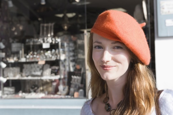 France, Pas-de-Calais, Escalles, Portrait of young woman in red beret. 
Photo: Jan Scherders