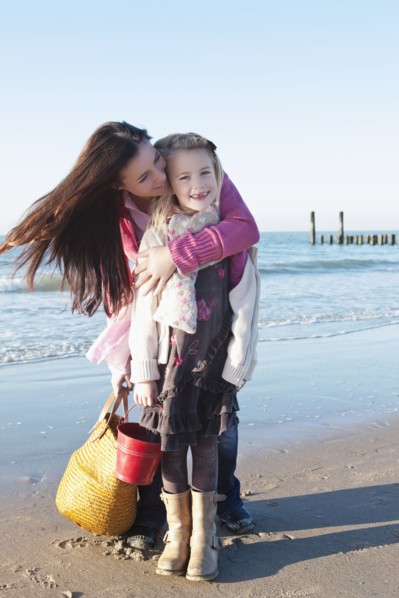Netherlands, Zeeland, Haamstede, Mother with daughter on beach. 
Photo : Jan Scherders