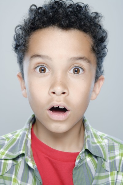 Portrait of boy (8-9), studio shot. 
Photo: Rob Lewine