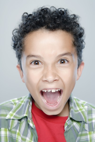 Portrait of boy (8-9), studio shot. 
Photo : Rob Lewine
