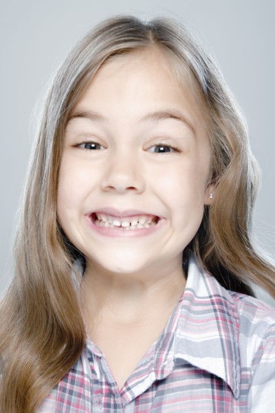 Portrait of girl (6-7), studio shot. 
Photo : Rob Lewine