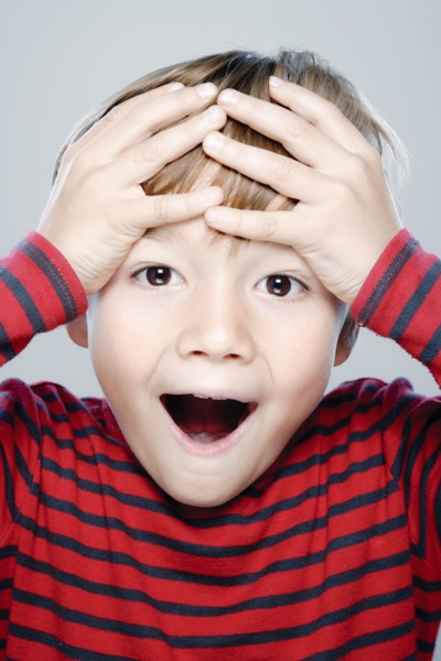 Portrait of boy (6-7), studio shot. 
Photo : Rob Lewine