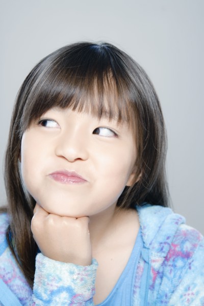 Portrait of girl (8-9), studio shot. 
Photo : Rob Lewine