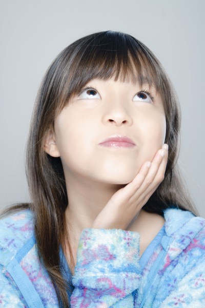 Portrait of girl (8-9), studio shot. 
Photo : Rob Lewine