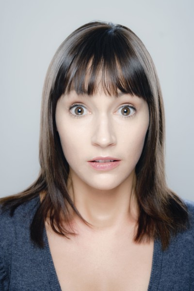 Portrait of young woman, studio shot. 
Photo : Rob Lewine
