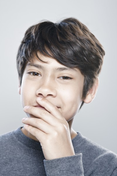 Portrait of boy (12-13) expressing positively. 
Photo : Rob Lewine