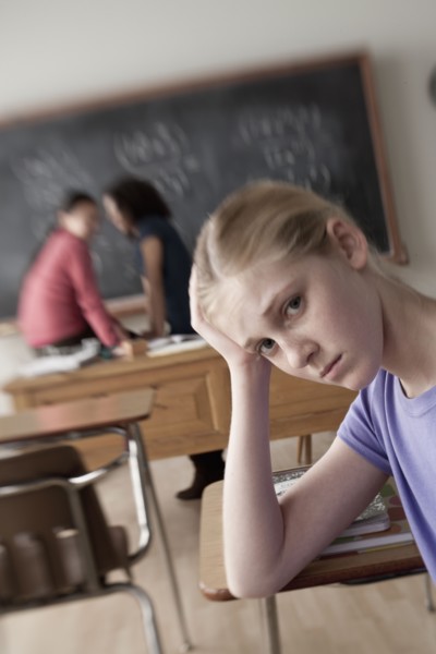 Teenage girls (14-15, 16-17) at school. 
Photo : Rob Lewine