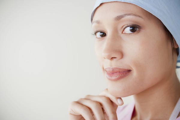 Portrait of doctor wearing surgical mask. 
Photo : Rob Lewine