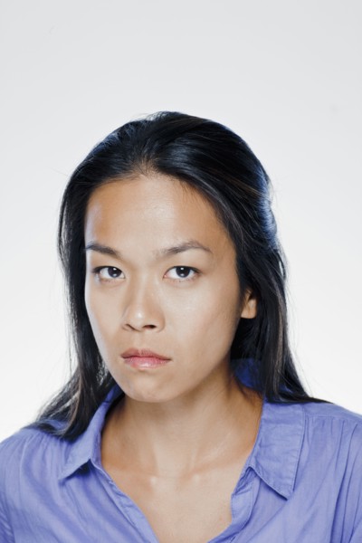 Portrait of angry young woman, studio shot. 
Photo: Rob Lewine