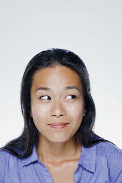 Portrait of smiling young woman, studio shot. 
Photo: Rob Lewine