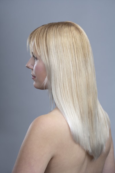 View of woman with blonde hair, studio shot. 
Photo : Mark de Leeuw