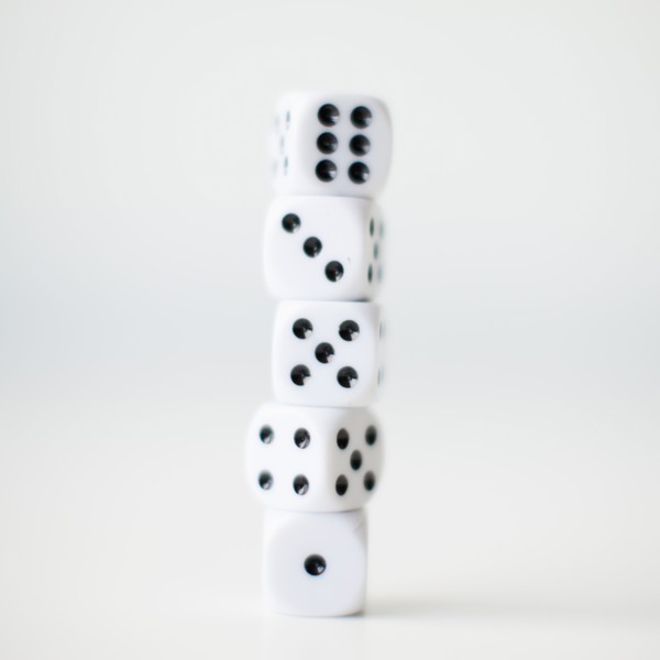 Dices on white background, studio shot. 
Photo: Jessica Peterson