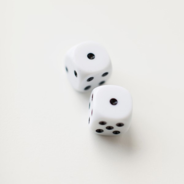 Dices on white background, studio shot. 
Photo: Jessica Peterson