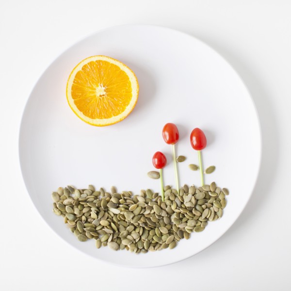 Landscape on plate made out of food, studio shot. 
Photo : Jessica Peterson