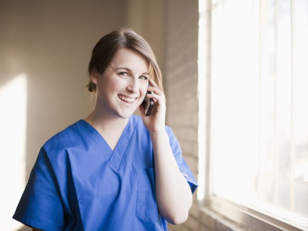 Young woman using mobile phone. 
Photo: Jessica Peterson