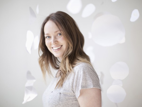 Portrait of cheerful young woman. 
Photo: Jessica Peterson