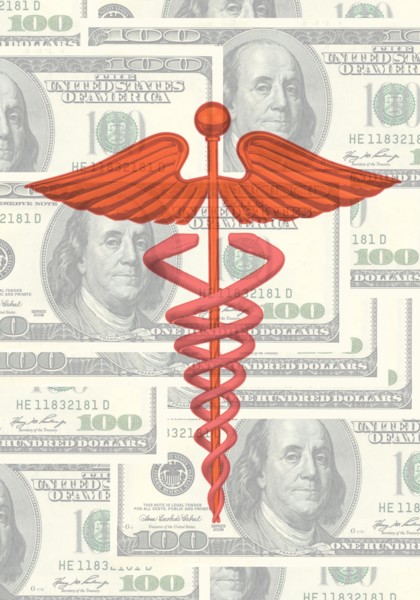 Caduceus and us dollar bills. 
Photo : Calysta Images