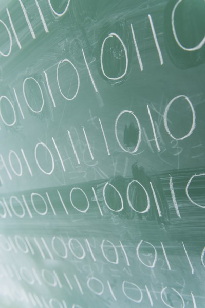 Binary code on blackboard.