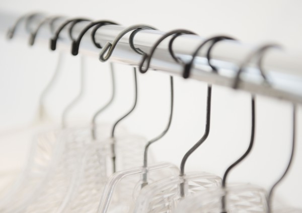 Coat hangers on clothes rack. Photo : Jamie Grill