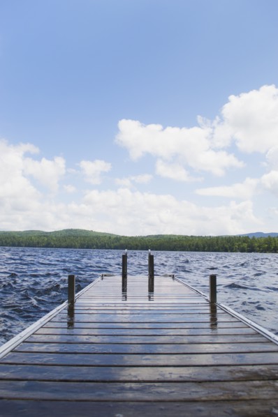View of lake with wooden jetty. Photo : Daniel Grill